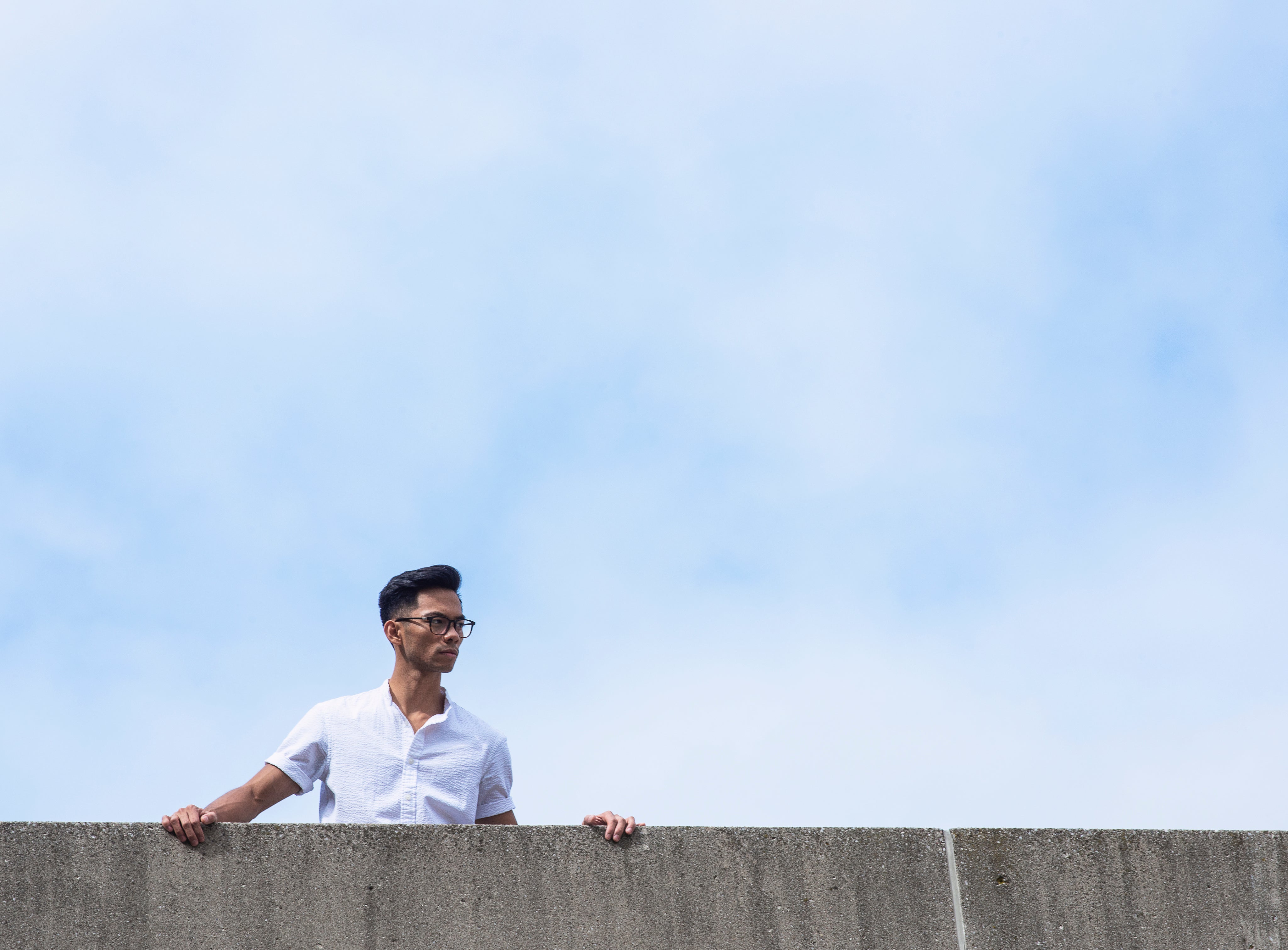 files/man-peers-over-wall.jpg